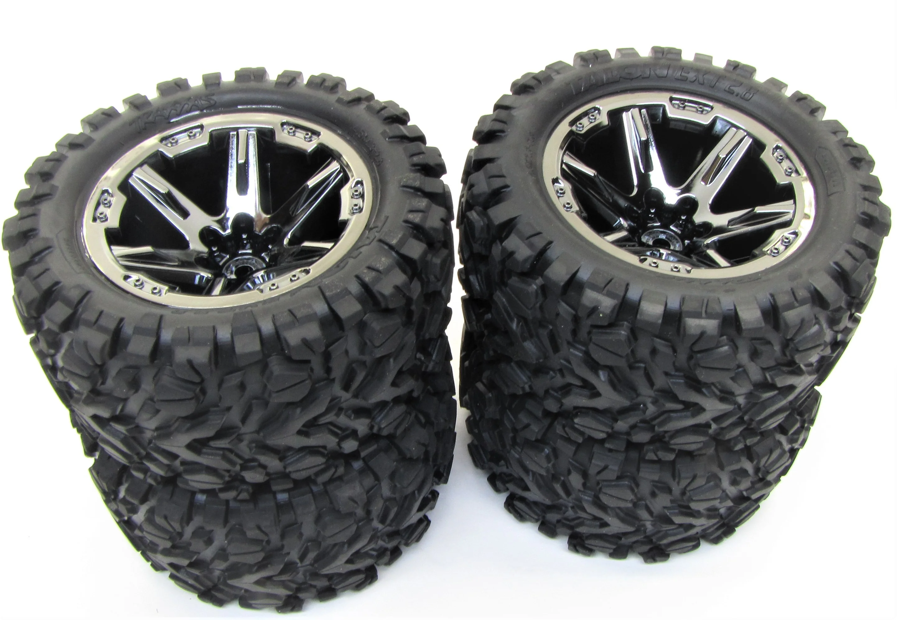 RUSTLER 4x4 TIRES, Wheels assembled (Black Chome Talon Tyres VXL 67376-4