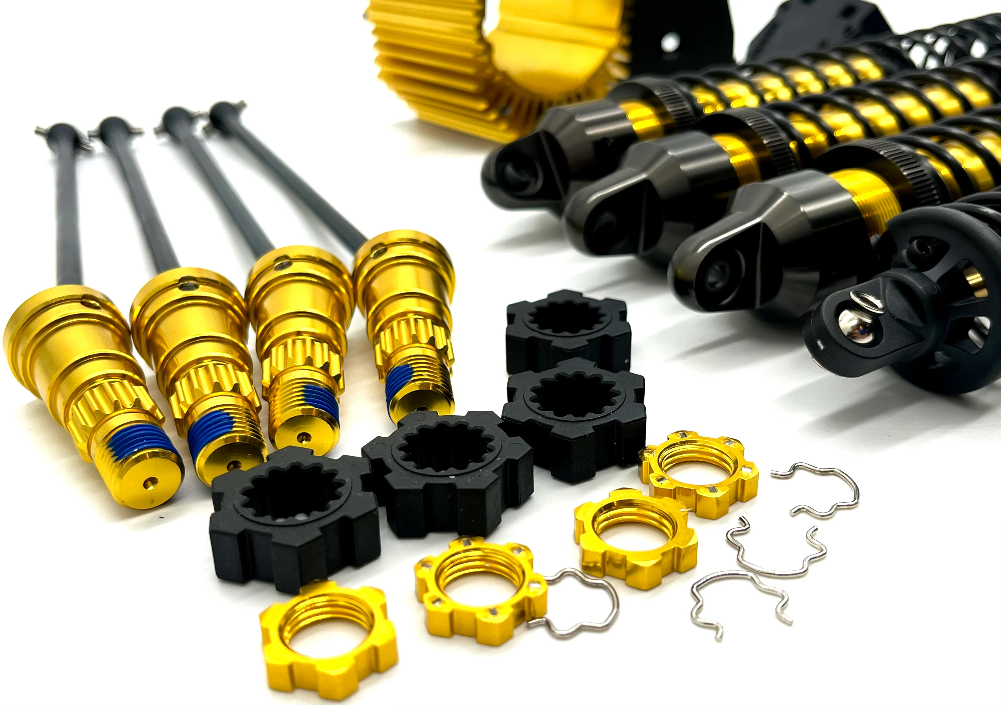 X-MAXX MT BIGFOOT Driveshaft, shocks, heat sink GOLD Ed 50th Traxxas 77097-4 - Image 4